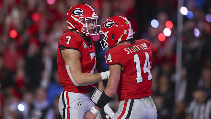 Nov 15, 2025; Athens, Georgia, USA; Georgia Bulldogs tight end Lawson Luckie (7) and quarterback Gunner Stockton (14) celebrate in the second half against the Texas Longhorns at Sanford Stadium. Mandatory Credit: Brett Davis-Imagn Images