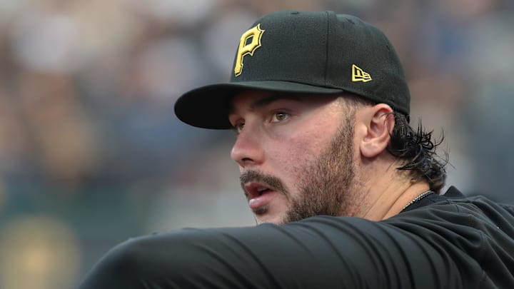 Sep 2, 2025; Pittsburgh, Pennsylvania, USA;  Pittsburgh Pirates  pitcher Paul Skenes (30) looks from the dugout against the Los Angeles Dodgers during the third inning at PNC Park. Mandatory Credit: Charles LeClaire-Imagn Images