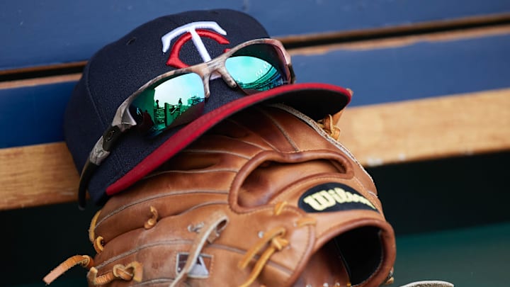 Apr 13, 2017; Detroit, MI, USA; Minnesota Twins hat and glove in the dugout during the game against the Minnesota Twins at Comerica Park. Mandatory Credit: Rick Osentoski-Imagn Images Apr 13, 2017; Detroit, MI, USA; Minnesota Twins hat and glove in the dugout during the game against the Minnesota Twins at Comerica Park. Mandatory Credit: Rick Osentoski-Imagn Images