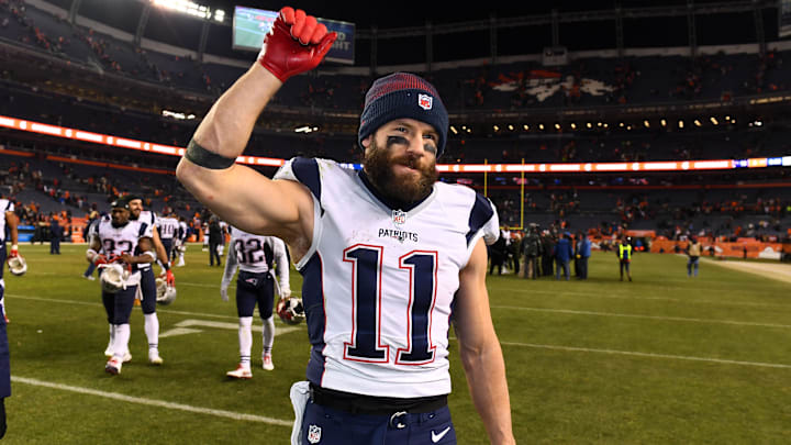 Dec 18, 2016; Denver, CO, USA; New England Patriots wide receiver Julian Edelman (11) celebrates the win over the Denver Broncos at Sports Authority Field. The Patriots defeated the Broncos 16-3. Mandatory Credit: Ron Chenoy-Imagn Images