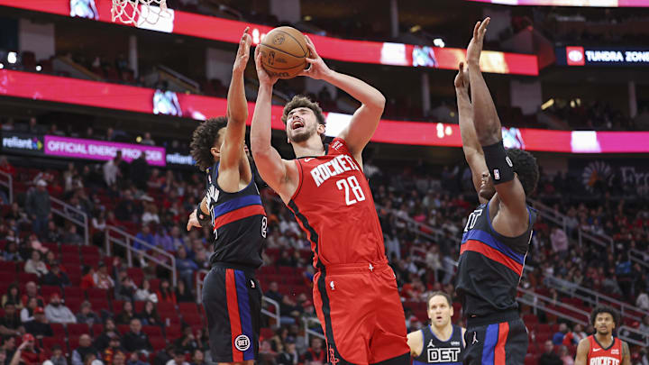 Jan 1, 2024; Houston, Texas, USA; Houston Rockets center Alperen Sengun (28) shoots the ball as Detroit Pistons guard Cade Cunningham (2): Troy Taormina-USA TODAY Sports