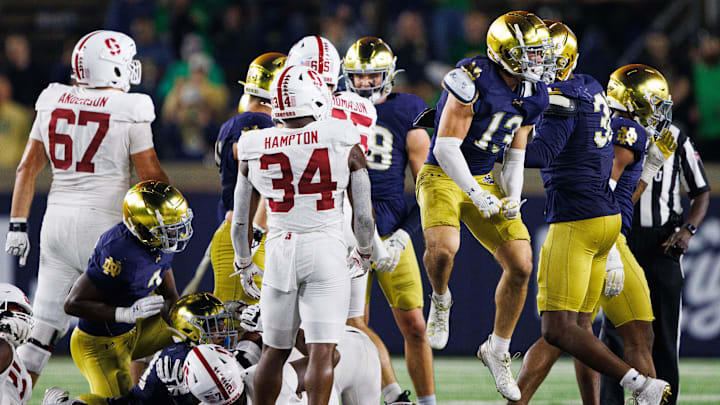 Notre Dame safety Ben Minich (13) celebrates getting a sack during a NCAA college football game between Notre Dame and Stanford at Notre Dame Stadium on Saturday, Oct. 12, 2024, in South Bend. Notre Dame safety Ben Minich (13) celebrates getting a sack during a NCAA college football game between Notre Dame and Stanford at Notre Dame Stadium on Saturday, Oct. 12, 2024, in South Bend.