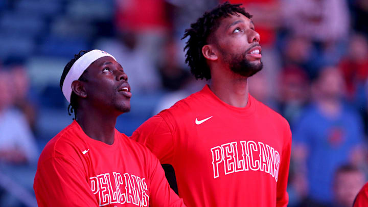 Oct 11, 2019; New Orleans, LA, USA; New Orleans Pelicans guard Jrue Holiday (11) and New Orleans Pelicans center Jahlil Okafor (8) watch a video before their game against the Utah Jazz at the Smoothie King Center. Mandatory Credit: Chuck Cook-Imagn Images