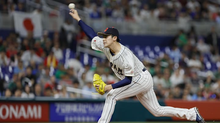 Mar 20, 2023; Miami, Florida, USA; Japan starting pitcher Roki Sasaki (14) delivers a pitch during the first inning against Mexico at LoanDepot Park. Mandatory Credit: Sam Navarro-Imagn Images Mar 20, 2023; Miami, Florida, USA; Japan starting pitcher Roki Sasaki (14) delivers a pitch during the first inning against Mexico at LoanDepot Park. Mandatory Credit: Sam Navarro-Imagn Images