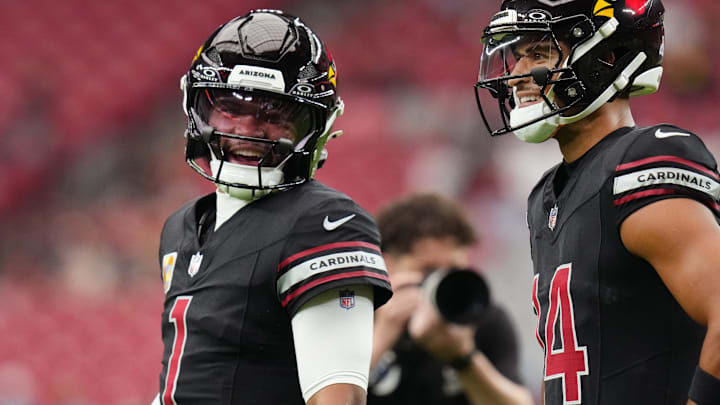 Arizona Cardinals quarterback Kyler Murray (1) chats with teammate Michael Wilson (14) before their game against the Tennessee Titans at State Farm Stadium in Glendale on Oct. 5, 2025.