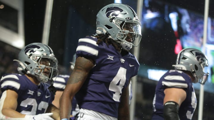 Kansas State senior wide receiver Malik Knowles (4) celebrates a touchdown over Kansas during the first quarter of Saturday's Sunflower Showdown at Bill Snyder Family Stadium.