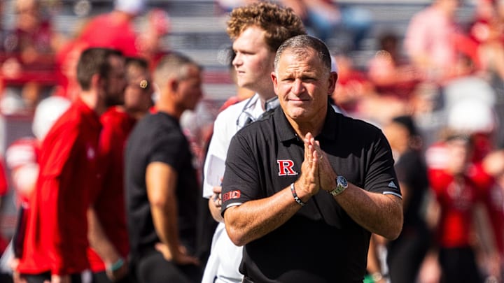 Oct 5, 2024; Lincoln, Nebraska, USA; Rutgers Scarlet Knights head coach Greg Schiano looks on during warmups before a game against the Nebraska Cornhuskers at Memorial Stadium. 
