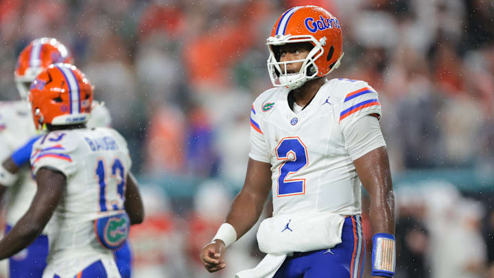 Sep 20, 2025; Miami Gardens, Florida, USA; Florida Gators quarterback DJ Lagway (2) looks on from the field against the Miami Hurricanes during the first quarter at Hard Rock Stadium. Mandatory Credit: Sam Navarro-Imagn Images