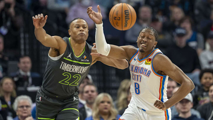 Feb 23, 2025; Minneapolis, Minnesota, USA; Minnesota Timberwolves guard Jaylen Clark (22) and Oklahoma City Thunder forward Jalen Williams (8) go after a loose ball in the first half at Target Center. Feb 23, 2025; Minneapolis, Minnesota, USA; Minnesota Timberwolves guard Jaylen Clark (22) and Oklahoma City Thunder forward Jalen Williams (8) go after a loose ball in the first half at Target Center.