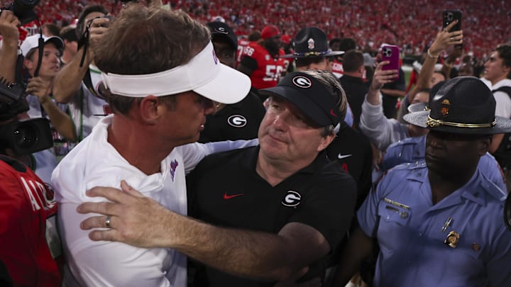 Oct 18, 2025; Athens, Georgia, USA; Georgia Bulldogs head coach Kirby Smart and Mississippi Rebels head coach Lane Kiffin meet on the field after the game at Sanford Stadium. Mandatory Credit: Brett Davis-Imagn Images Oct 18, 2025; Athens, Georgia, USA; Georgia Bulldogs head coach Kirby Smart and Mississippi Rebels head coach Lane Kiffin meet on the field after the game at Sanford Stadium. Mandatory Credit: Brett Davis-Imagn Images