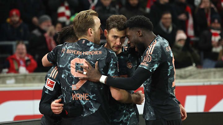 Bayern Munich players celebrating a goal against VfB Stuttgart on matchday 24.