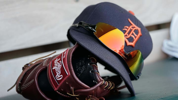 Aug 3, 2018; Oakland, CA, USA; General view of the Detroit Tigers baseball cap, sunglasses and glove before the game against the Oakland Athletics at the Oakland Coliseum.
