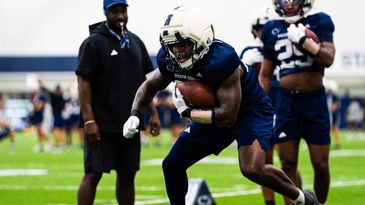Penn State running back Cam Wallace runs through a drill during a practice session inside Holuba Hall on Monday, August 10, 2026, in State College.