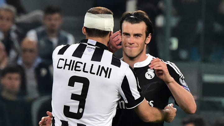Los jugadores Gareth Bale y Giorgio Chiellini en un partido entre Juventus y Real Madrid.