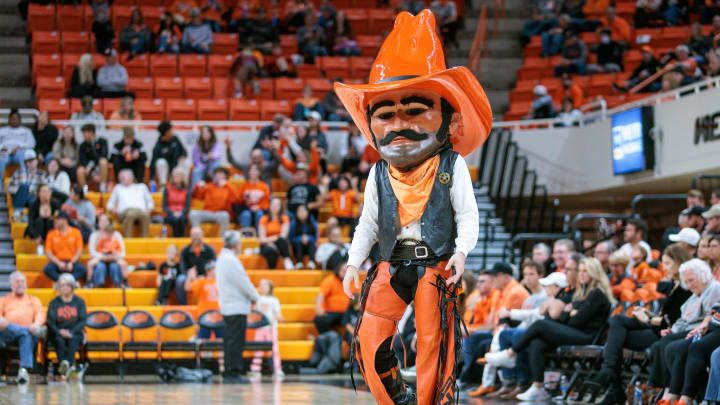 Nov 20, 2023; Stillwater, Oklahoma, USA; Oklahoma State Cowboys mascot Pistol Pete looks on during a break in play against the New Orleans Privateers during the second half at Gallagher-Iba Arena. Mandatory Credit: William Purnell-USA TODAY Sports
