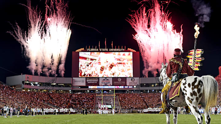 Oct 15, 2022; Tallahassee, Florida, USA; Florida State Seminoles symbols Osceola and Renegade watch as the team come out of the tunnel before a game against the Clemson Tigers at Doak S. Campbell Stadium. Mandatory Credit: Melina Myers-Imagn Images
