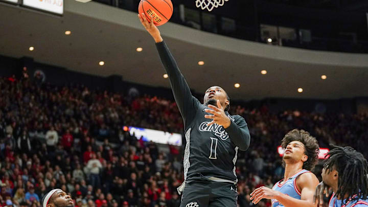Cincinnati Bearcats guard Day Day Thomas (1) hits a layup in the first half of a NCAA men’s basketball game between the Cincinnati Bearcats and Dayton Flyers, Friday, Dec. 20, 2024, at Heritage Bank Center in downtown Cincinnati.