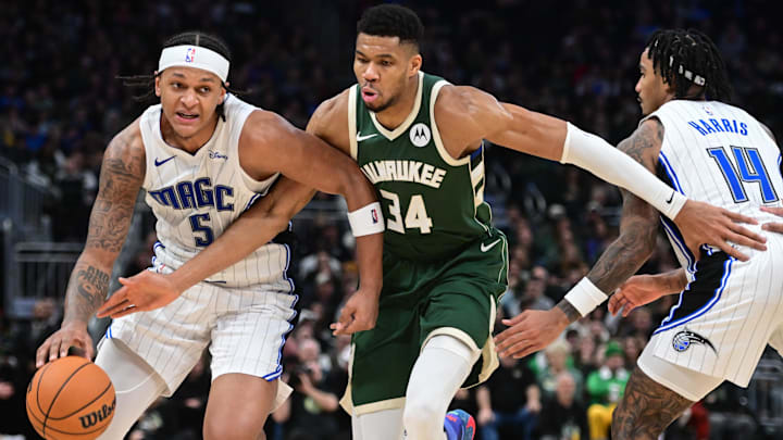 Milwaukee Bucks forward Giannis Antetokounmpo (34) fouls Orlando Magic forward Paolo Banchero (5) in the fourth quarter at Fiserv Forum. Milwaukee Bucks forward Giannis Antetokounmpo (34) fouls Orlando Magic forward Paolo Banchero (5) in the fourth quarter at Fiserv Forum.