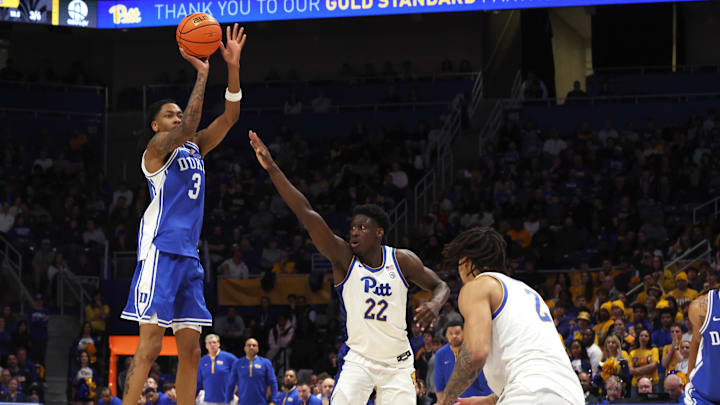 Feb 10, 2026; Pittsburgh, Pennsylvania, USA;  Duke basketball guard Isaiah Evans (3) shoots a three-point basket against Pittsburgh Panthers guard Barry Dunning Jr. (22) during the second half at Petersen Events Center.
