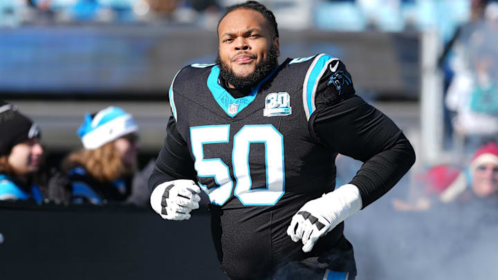 Carolina Panthers guard Robert Hunt (50) takes the field during the first quarter against the Arizona Cardinals at Bank of America Stadium.