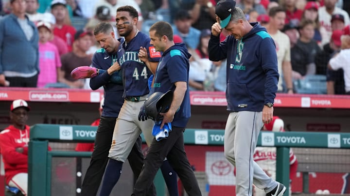 Seattle Mariners outfielder Julio Rodriguez (44) walks off the field after being hit by a batted ball against the Los Angeles Angels on June 7 at Angel Stadium.