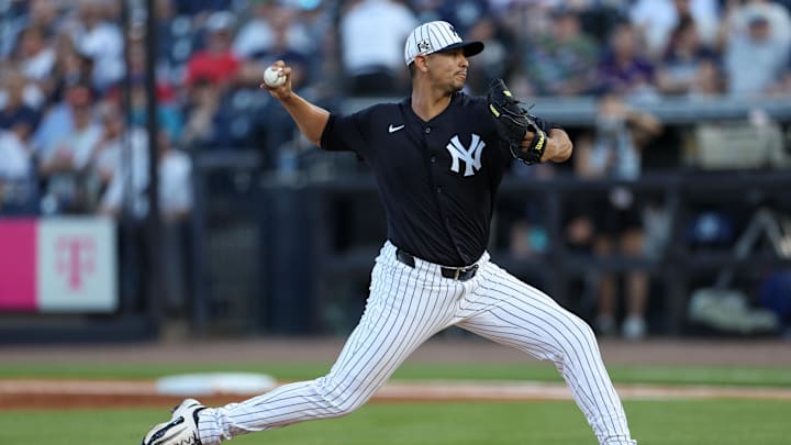 Mar 14, 2025; Tampa, Florida, USA; New York Yankees pitcher Carlos Carrasco (59) throws a pitch against the Philadelphia Phillies in the first inning during spring training at George M. Steinbrenner Field. Mandatory Credit: Nathan Ray Seebeck-Imagn Images