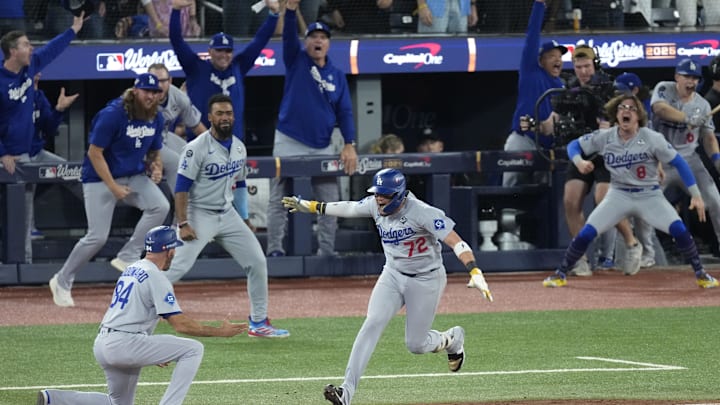 Nov 1, 2025; Toronto, Ontario, CAN; Los Angeles Dodgers second baseman Miguel Rojas (72) celebrates after hitting a home run against the Toronto Blue Jays in the ninth inning during game seven of the 2025 MLB World Series at Rogers Centre. Mandatory Credit: Kevin Sousa-Imagn Images