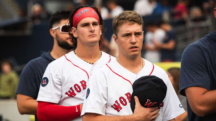 WooSox players Kyle Teel (right) and Roman Anthony stand for the national anthem ahead of a game on Aug. 16 at Polar Park.