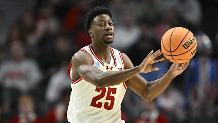 Mar 19, 2026; Portland, OR, USA; Wisconsin Badgers guard John Blackwell (25) passes against the High Point Panthers during the first half of a first round game of the men's 2026 NCAA Tournament at Moda Center. Mandatory Credit: Craig Strobeck-Imagn Images Mar 19, 2026; Portland, OR, USA; Wisconsin Badgers guard John Blackwell (25) passes against the High Point Panthers during the first half of a first round game of the men's 2026 NCAA Tournament at Moda Center. Mandatory Credit: Craig Strobeck-Imagn Images