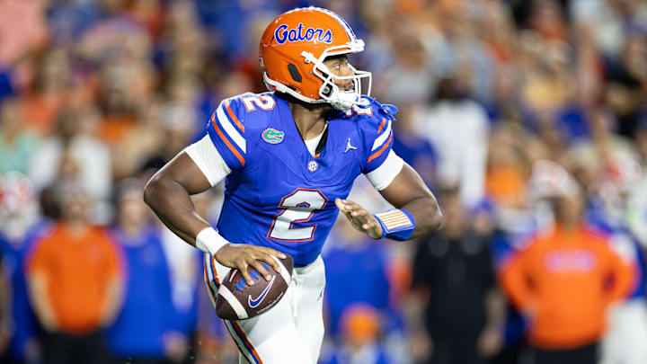 Oct 19, 2024; Gainesville, Florida, USA; Florida Gators quarterback DJ Lagway (2) scrambles with the ball against the Kentucky Wildcats during the first half at Ben Hill Griffin Stadium. Mandatory Credit: Matt Pendleton-Imagn Images