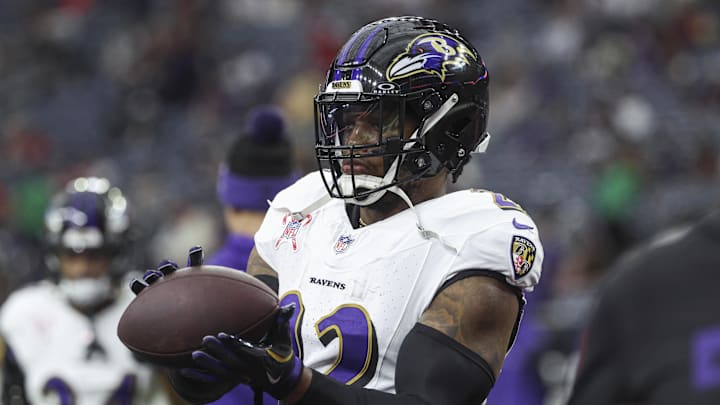 Dec 15, 2024; Houston, Texas, USA; Baltimore Ravens running back Derrick Henry (22) warms up before the game against the Houston Texans at NRG Stadium. Mandatory Credit: Troy Taormina-Imagn Images