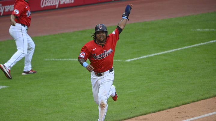 Jun 23, 2024; Cleveland, Ohio, USA; Cleveland Guardians designated hitter Jose Ramirez (11) scores in the third inning against the Toronto Blue Jays at Progressive Field.