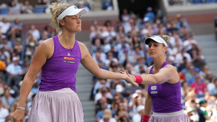 Erin Routliffe (NZE) (left) and Gabriela Dabrowski (CAN) playing Katerina Siniakova (CZE) and Taylor Townsend (USA) on day thirteen of the 2025 U.S. Open tennis tournament at the USTA Billie Jean King National Tennis Center. Erin Routliffe (NZE) (left) and Gabriela Dabrowski (CAN) playing Katerina Siniakova (CZE) and Taylor Townsend (USA) on day thirteen of the 2025 U.S. Open tennis tournament at the USTA Billie Jean King National Tennis Center.