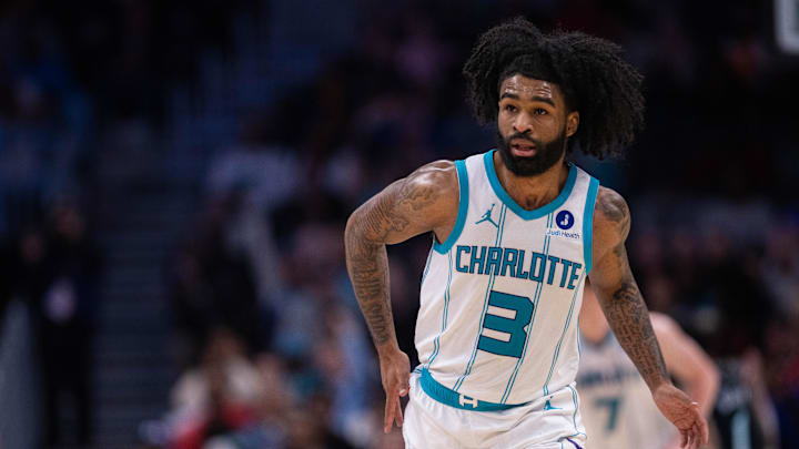 Charlotte Hornets guard Coby White (3) celebrates a three point basket against the Portland Trail Blazers