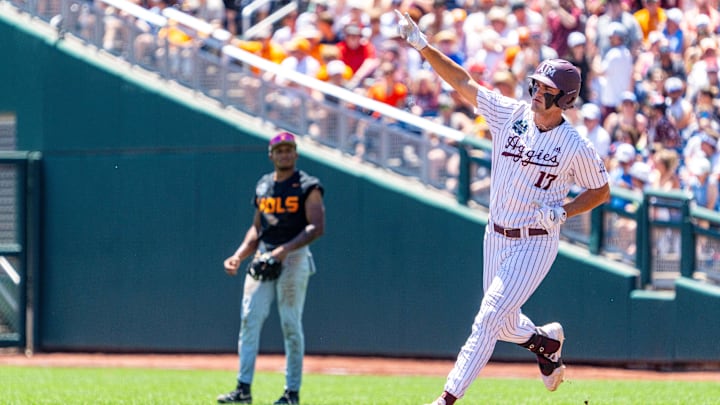 Texas A&M Aggies right fielder Jace Laviolette (17) celebrates after hitting a home run against the Tennessee Volunteers during the first inning at Charles Schwab Field Omaha.