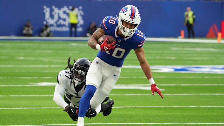 Oct 8, 2023; London United Kingdom; Buffalo Bills wide receiver Khalil Shakir (10) is pursued by Jacksonville Jaguars cornerback Tre Herndon (37) during the second half of an NFL International Series game at Tottenham Hotspur Stadium