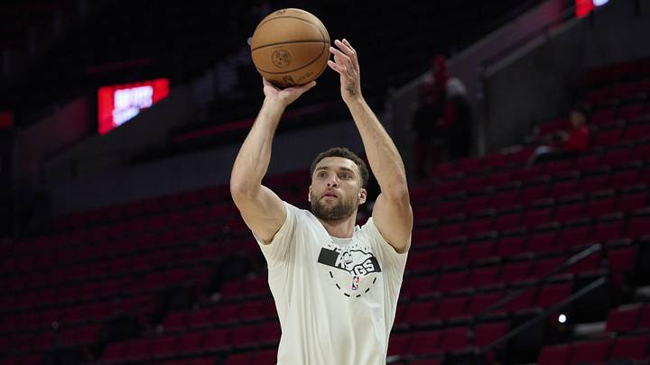 Apr 12, 2026; Portland, Oregon, USA; Sacramento Kings guard Zach LaVine (8) warms up before a game against the Portland Trail Blazers at Moda Center. 