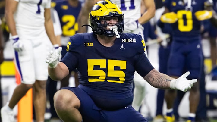 Jan 8, 2024; Houston, TX, USA; Michigan Wolverines defensive lineman Mason Graham (55) against the Washington Huskies during the 2024 College Football Playoff national championship game at NRG Stadium. Mandatory Credit: Mark J. Rebilas-Imagn Images