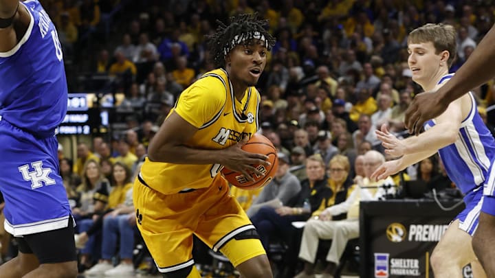 Mar 8, 2025; Columbia, Missouri, USA; Missouri Tigers guard Anthony Robinson II (0) drive to the basket against the Kentucky Wildcats in the first half at Mizzou Arena. Mandatory Credit: Gary Rohman-Imagn Images Mar 8, 2025; Columbia, Missouri, USA; Missouri Tigers guard Anthony Robinson II (0) drive to the basket against the Kentucky Wildcats in the first half at Mizzou Arena. Mandatory Credit: Gary Rohman-Imagn Images