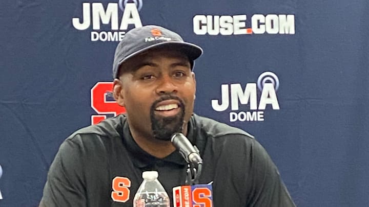 Syracuse coach Fran Brown is all smiles as he speaks with the media following the Orange's 31-28 win over Georgia Tech in the JMA Wireless Dome, on September 7, 2024.