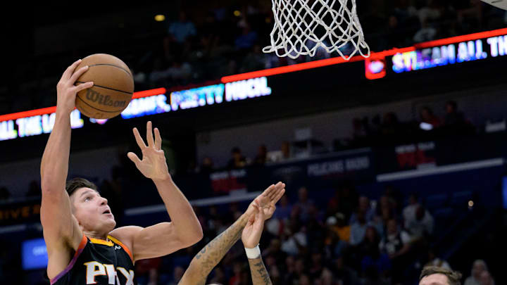 Apr 1, 2024; New Orleans, Louisiana, USA; Phoenix Suns guard Grayson Allen (8) shoots against New Apr 1, 2024; New Orleans, Louisiana, USA; Phoenix Suns guard Grayson Allen (8) shoots against New