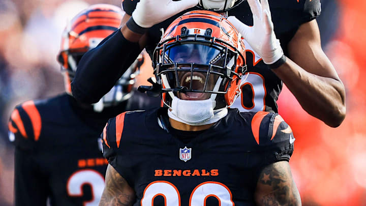 Dec 22, 2024; Cincinnati, Ohio, USA; Cincinnati Bengals running back Trayveon Williams (32) reacts after a play with safety Tycen Anderson (26) in the first half against the Cleveland Browns at Paycor Stadium. Mandatory Credit: Katie Stratman-Imagn Images
