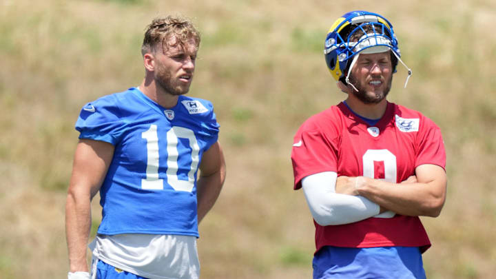 May 21, 2024, Thousand Oaks, California, USA; Los Angeles Rams wide receiver Cooper Kupp (10) and quarterback Matthew Stafford (9) during organized team activities at Cal Lutheran University. Mandatory Credit: Kirby Lee-USA TODAY Sports