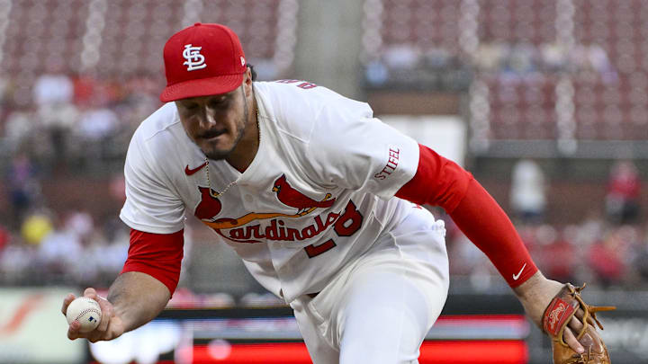 Jun 24, 2025; St. Louis, Missouri, USA;  St. Louis Cardinals third baseman Nolan Arenado (28) fields a ground ball against the Chicago Cubs during the fifth inning at Busch Stadium. Mandatory Credit: Jeff Curry-Imagn Images