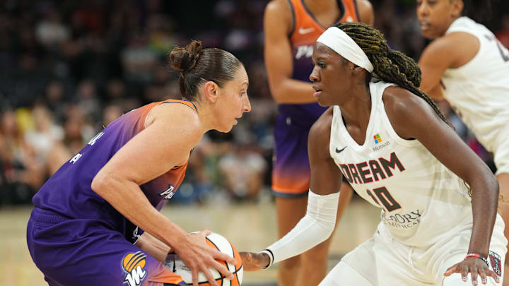 Aug 3, 2023; Phoenix, Arizona, USA; Atlanta Dream guard Rhyne Howard (10) plays defense against Phoenix Mercury guard Diana Taurasi (3) during the game at at Footprint Center. Mandatory Credit: Joe Camporeale-Imagn Images