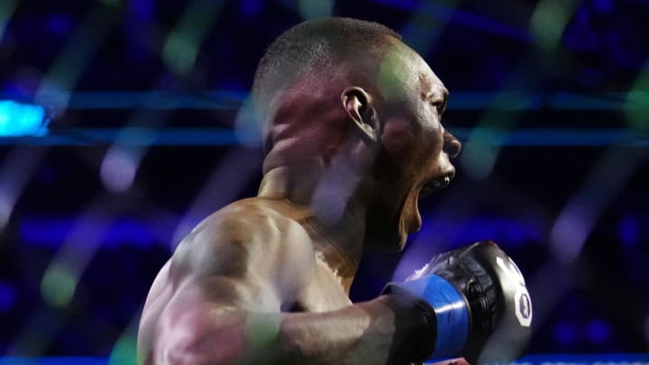 Apr 8, 2023; Miami, Florida, USA; Israel Adesanya (blue gloves) before the fight against Alex Pereira (red gloves) during UFC 287 at Miami-Dade Arena. Mandatory Credit: Rich Storry-USA TODAY Sports Apr 8, 2023; Miami, Florida, USA; Israel Adesanya (blue gloves) before the fight against Alex Pereira (red gloves) during UFC 287 at Miami-Dade Arena. Mandatory Credit: Rich Storry-USA TODAY Sports