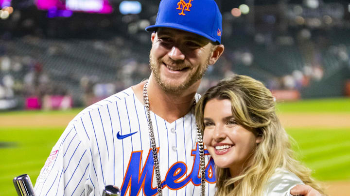 July 12, 2021; Denver, CO, USA; New York Mets first baseman Pete Alonso poses for photographs with wife Haley Walsh and the winners trophy following his victory in the 2021 MLB Home Run Derby. July 12, 2021; Denver, CO, USA; New York Mets first baseman Pete Alonso poses for photographs with wife Haley Walsh and the winners trophy following his victory in the 2021 MLB Home Run Derby.