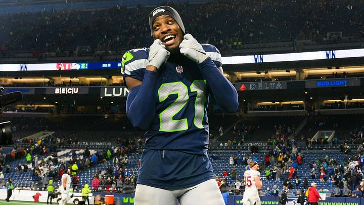 Seattle Seahawks cornerback Devon Witherspoon (21) walks off the field after the game against the Arizona Cardinals. Seattle Seahawks cornerback Devon Witherspoon (21) walks off the field after the game against the Arizona Cardinals.
