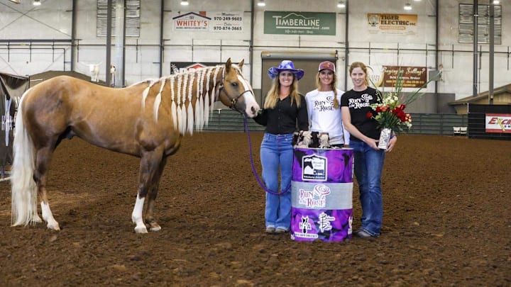 Adios Pantalones and Tricia Aldridge soaking up the win at the Run at the Rose.