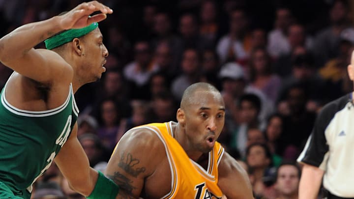 Jan 30, 2011; Los Angeles, CA, USA;  Boston Celtics forward Paul Pierce (34) defends Los Angeles Lakers guard Kobe Bryant (24) during the 4th quarter of the game at the Staples Center. The Celtics won 109-96. Mandatory Credit: Jayne Kamin-Oncea-Imagn Images